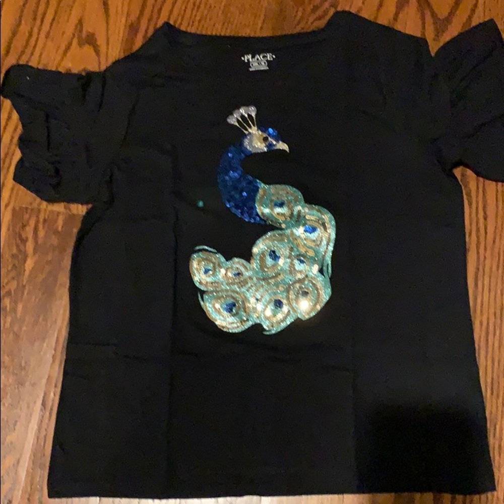 3/$20 or $10 per item Girls tee shirt. Size 16